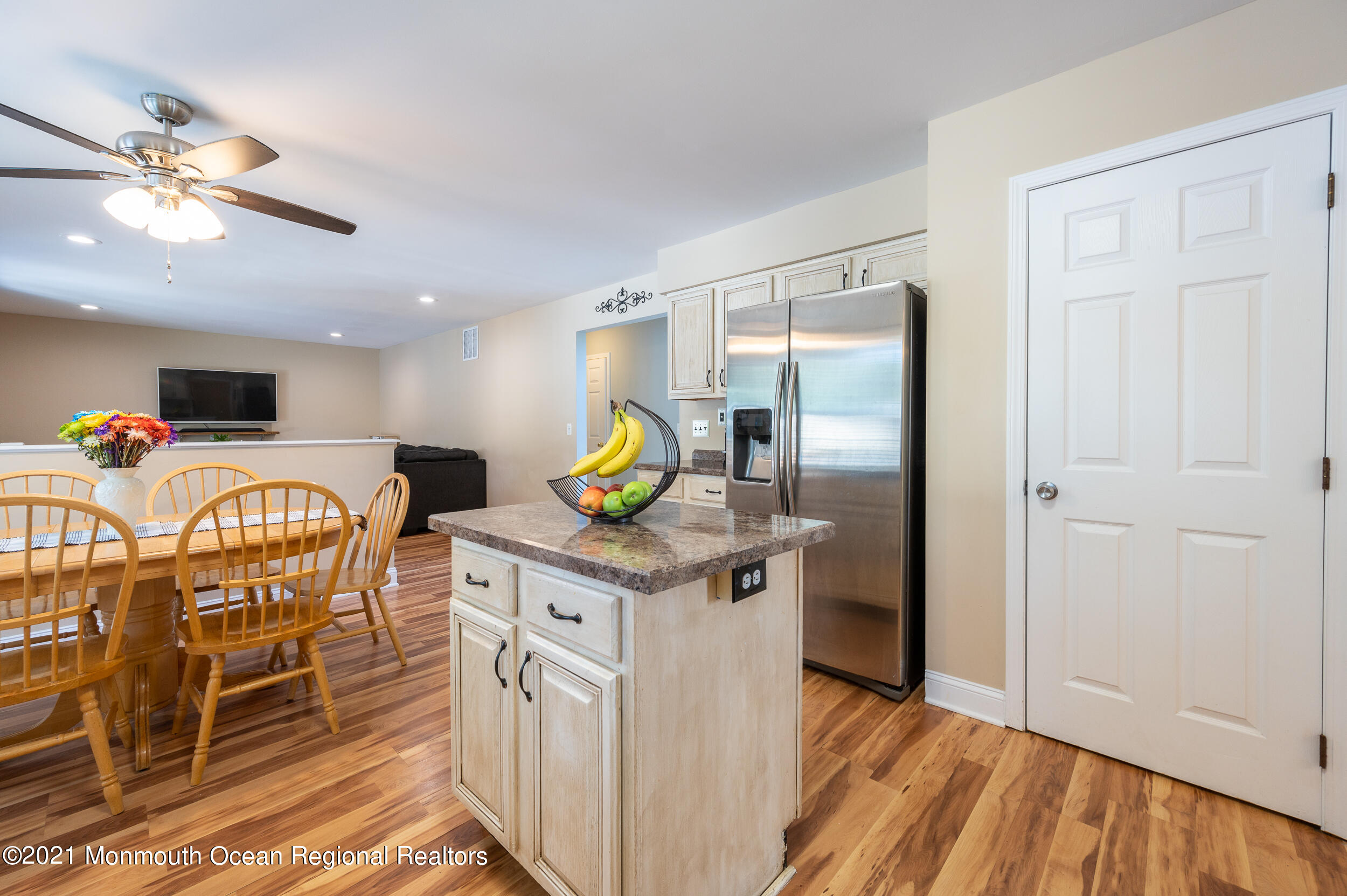 121 Lanyard Road Manahawkin, NJ 08050 - Photo 18 of 39 a kitchen with stainless steel appliances granite countertop a stove refrigerator and cabinets