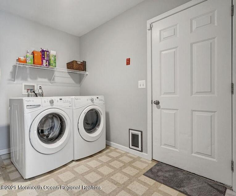 121 Lanyard Road Manahawkin, NJ 08050 - Photo 23 of 39 a utility room with dryer and washer