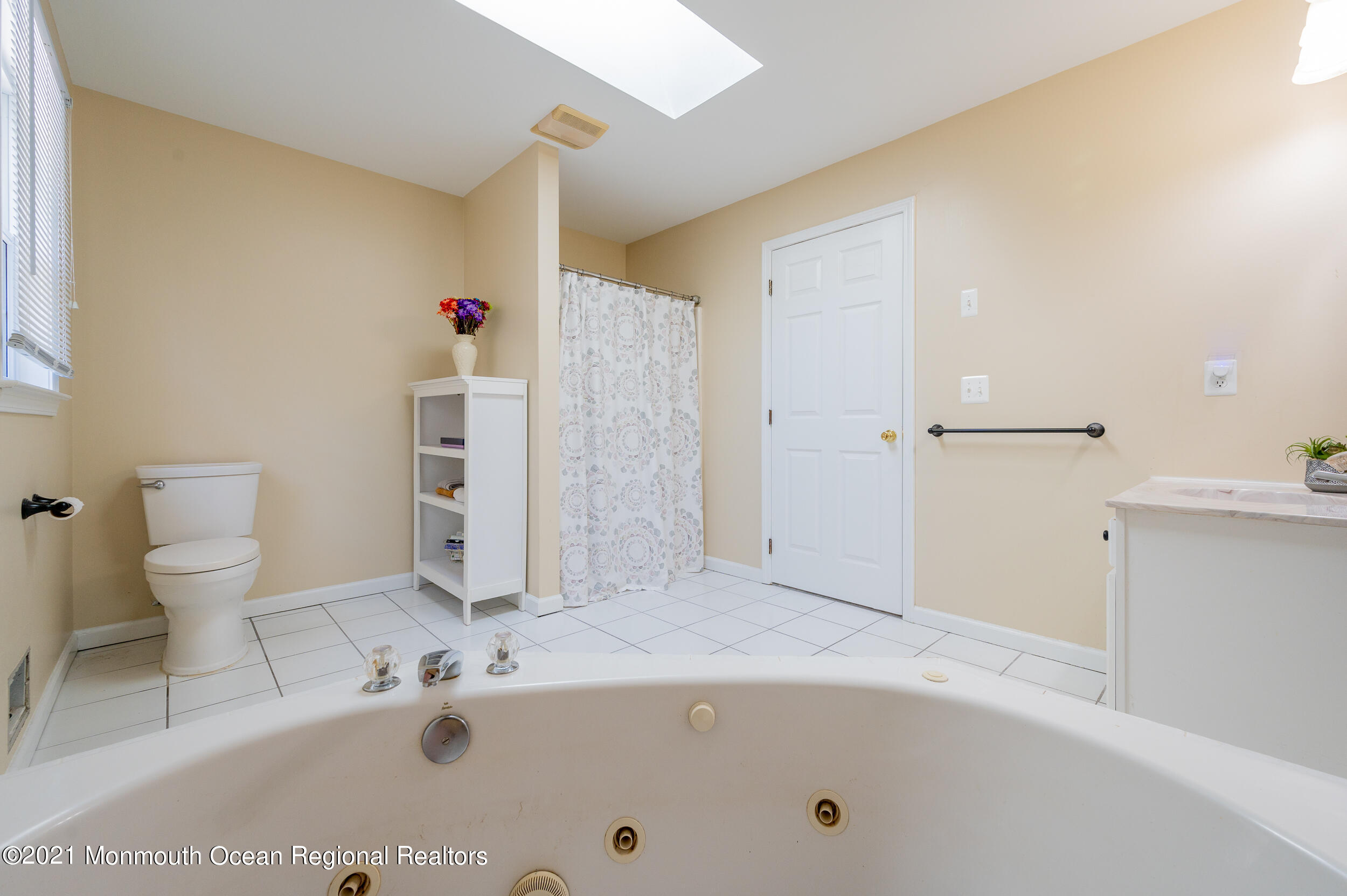121 Lanyard Road Manahawkin, NJ 08050 - Photo 27 of 39 a bathroom with a sink and toilet