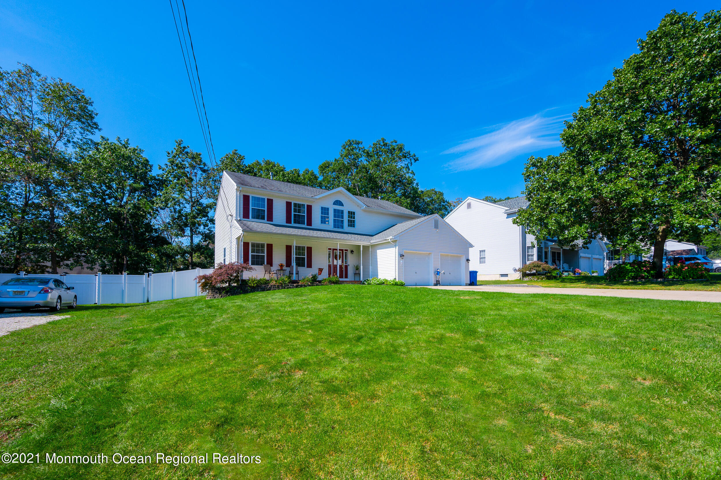 121 Lanyard Road Manahawkin, NJ 08050 - Photo 39 of 39 a view of a house with backyard and garden