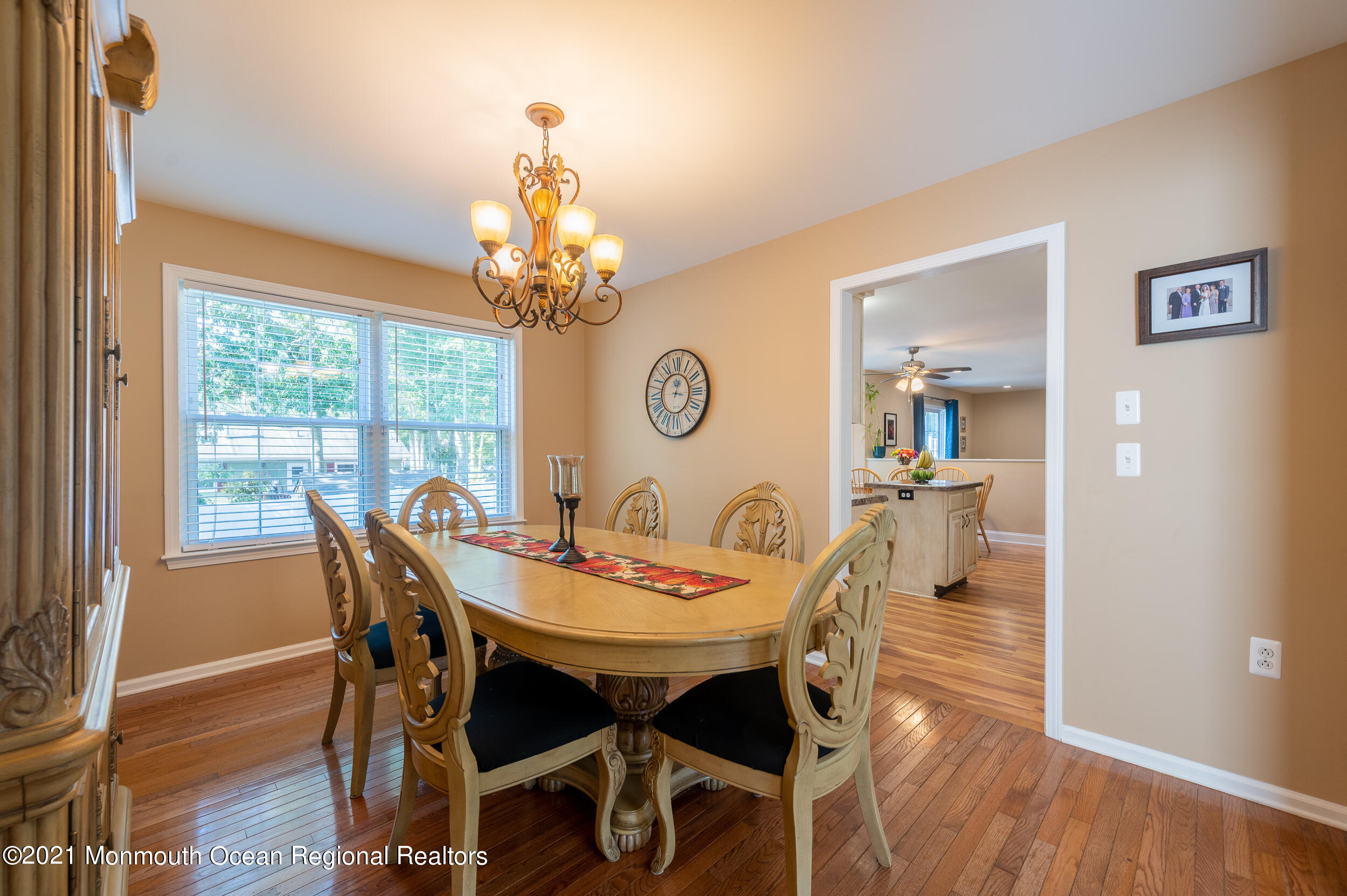 121 Lanyard Road Manahawkin, NJ 08050 - Photo 10 of 39 a view of a dining room with furniture window and wooden floor