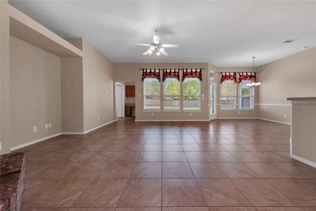 910 Derby Court Celina, TX 75009 - Photo 7 of 27 a view of an empty room with a window