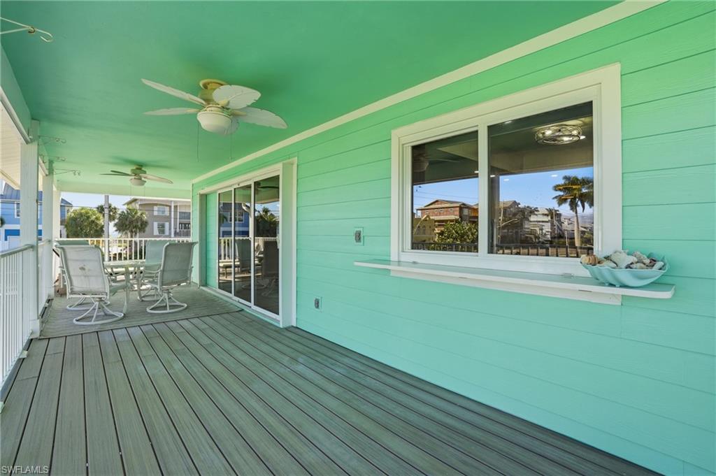 170 Redfish Road Fort Myers Beach, FL 33931 - Photo 28 of 48 a view of a house with a deck