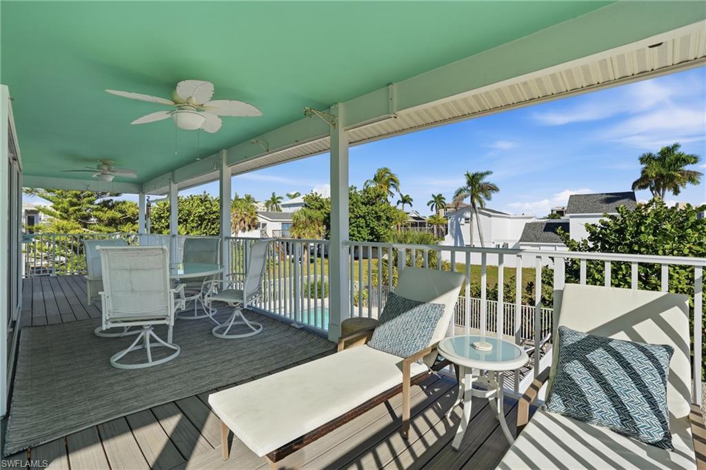 170 Redfish Road Fort Myers Beach, FL 33931 - Photo 32 of 48 a view of a balcony dining area