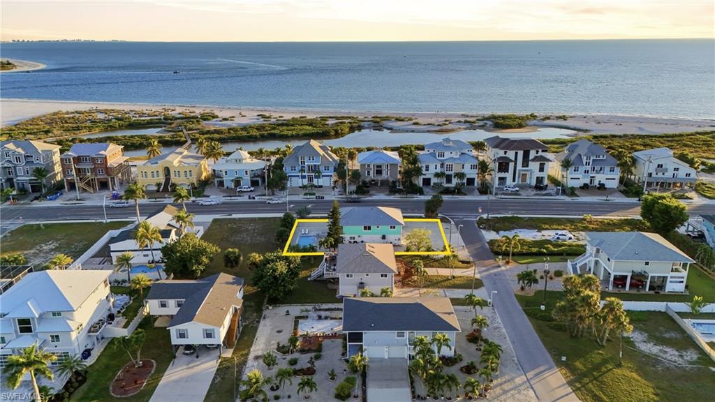 170 Redfish Road Fort Myers Beach, FL 33931 - Photo 40 of 48 an aerial view of a building with outdoor space