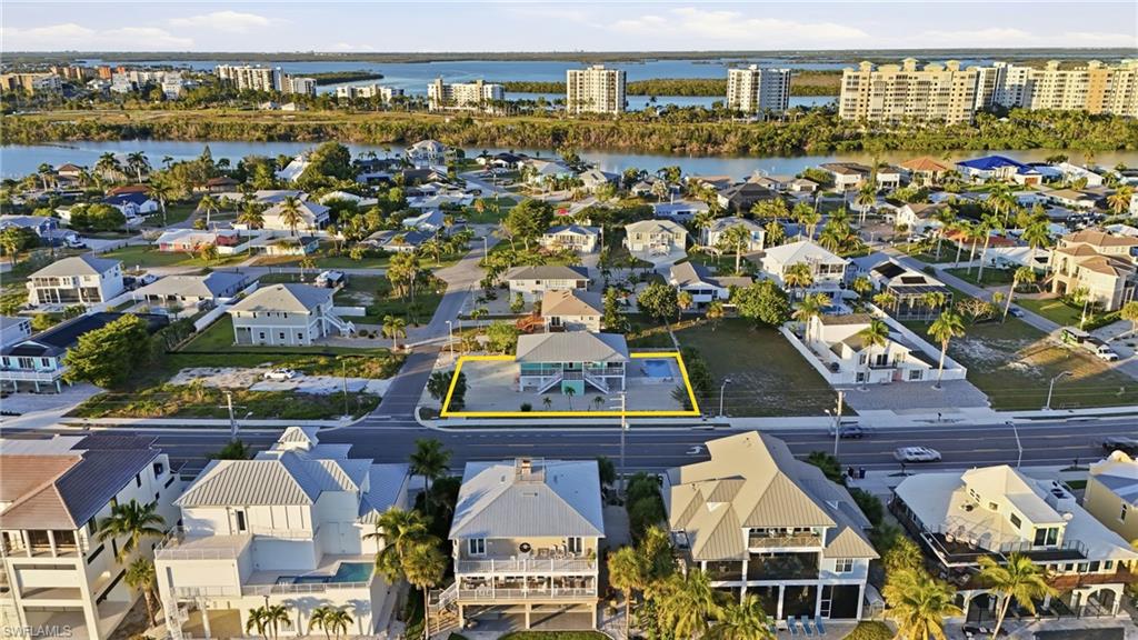 170 Redfish Road Fort Myers Beach, FL 33931 - Photo 41 of 48 an aerial view of residential houses with outdoor space