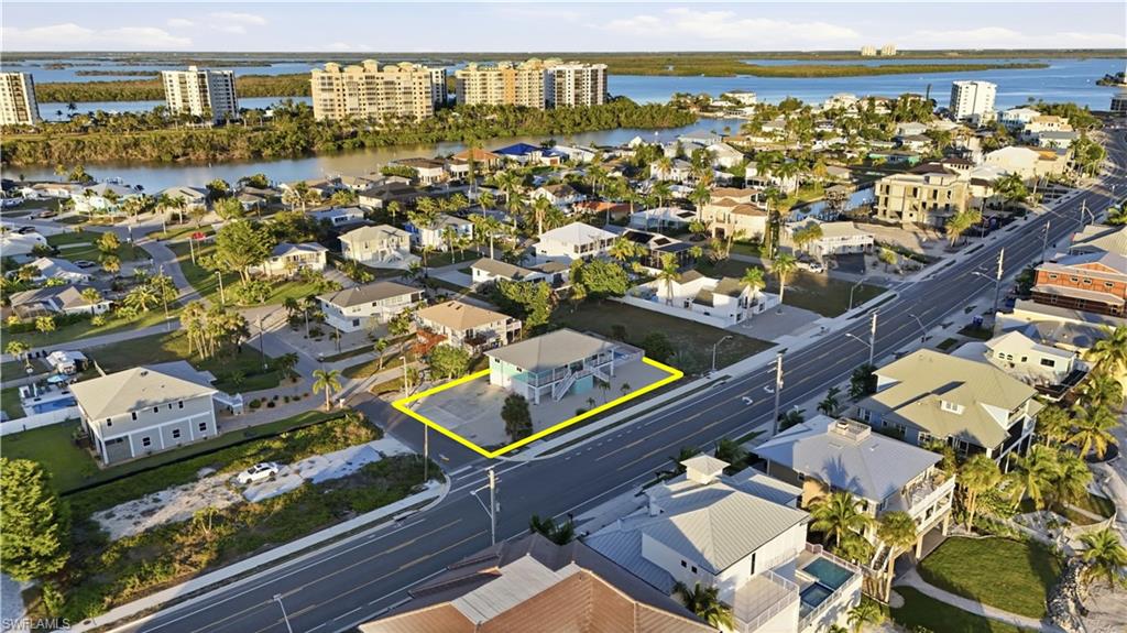 170 Redfish Road Fort Myers Beach, FL 33931 - Photo 44 of 48 an aerial view of residential houses with outdoor space