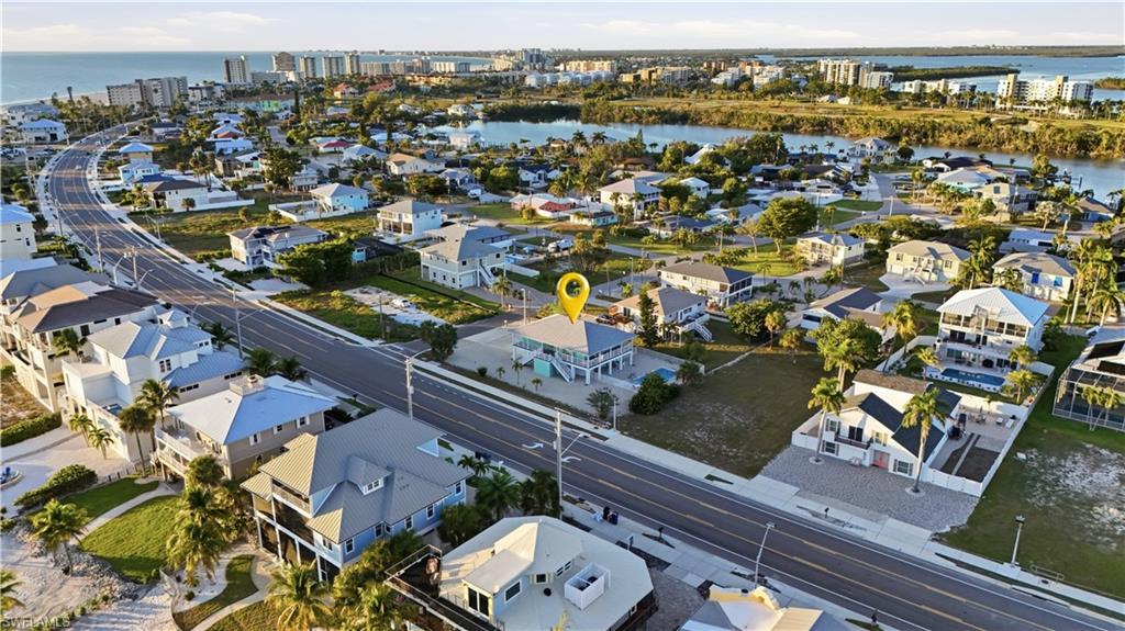 170 Redfish Road Fort Myers Beach, FL 33931 - Photo 45 of 48 an aerial view of residential houses with outdoor space