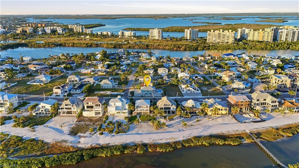 170 Redfish Road Fort Myers Beach, FL 33931 - Photo 46 of 48 an aerial view of residential houses with outdoor space