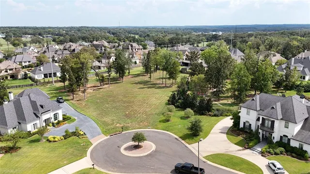 an aerial view of a house with outdoor space