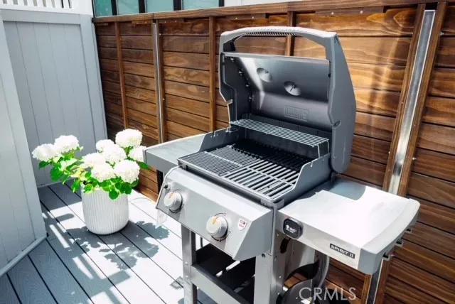 a view of a balcony with furniture