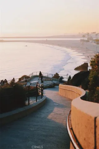 a terrace with outdoor seating and city view