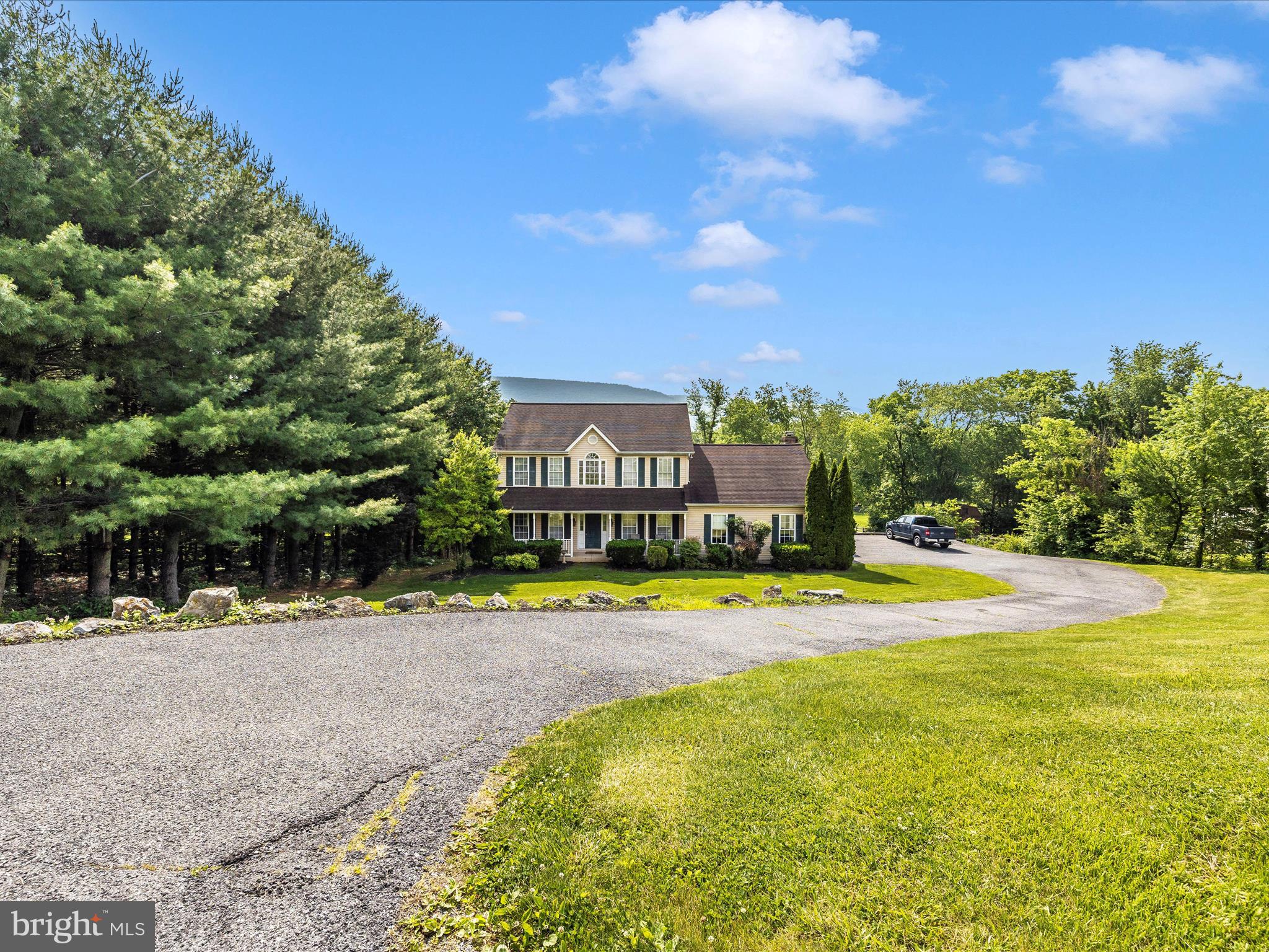 a view of a swimming pool with an outdoor space and seating area