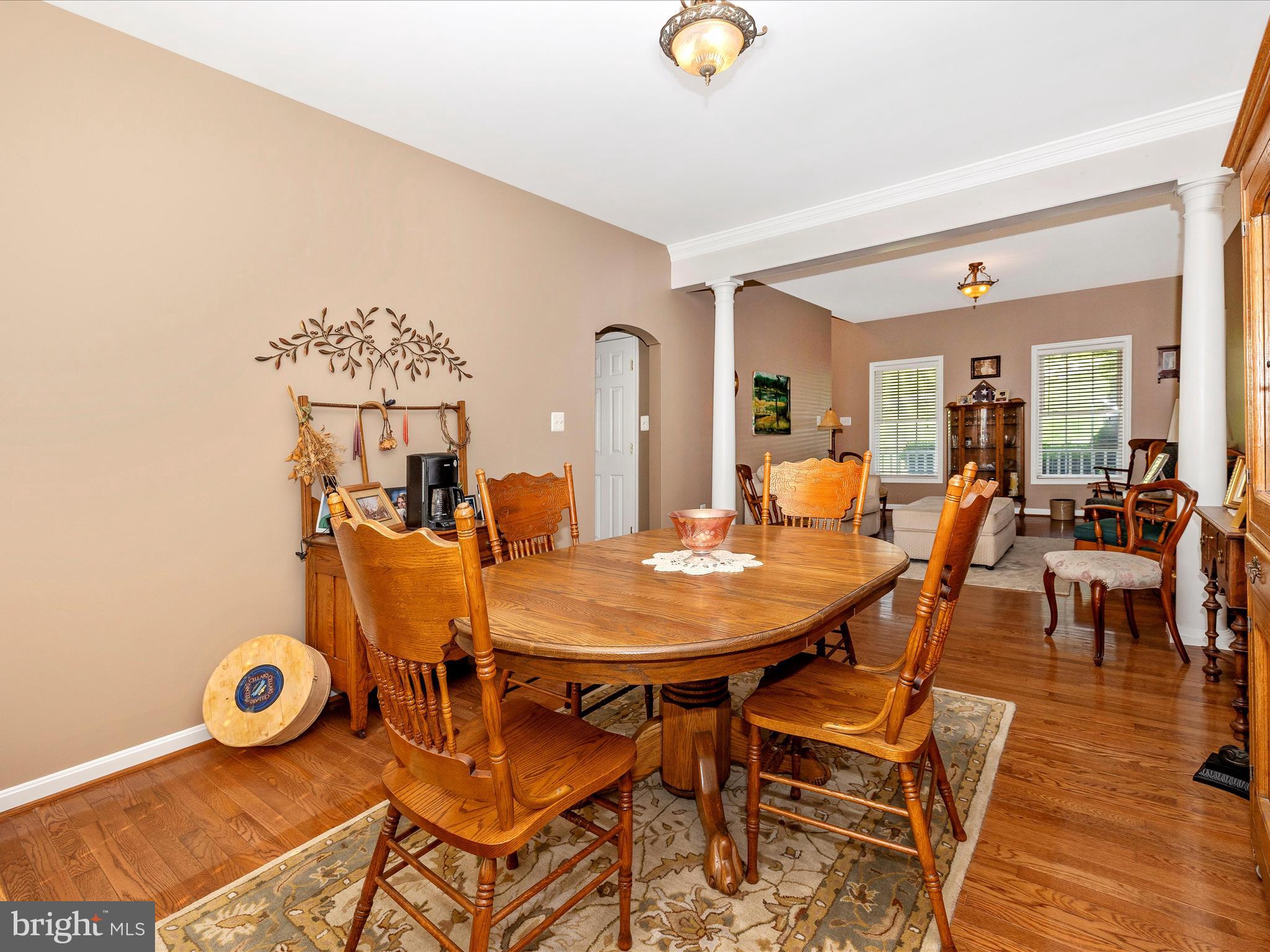 9503 Childacrest Drive Boonsboro, MD 21713 - Photo 15 of 59 a view of a dining room with furniture and wooden floor