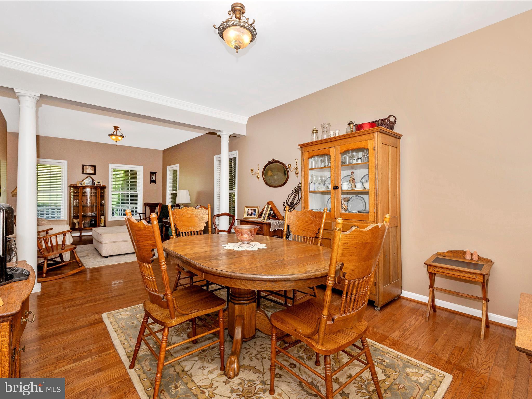 9503 Childacrest Drive Boonsboro, MD 21713 - Photo 16 of 59 a view of a dining room with furniture and wooden floor