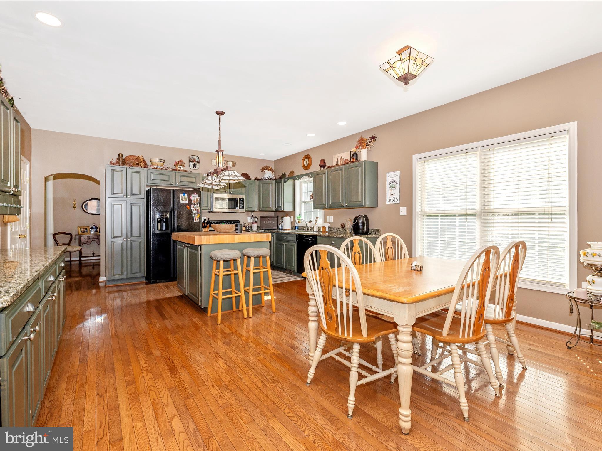 9503 Childacrest Drive Boonsboro, MD 21713 - Photo 22 of 59 a dining room with furniture and wooden floor