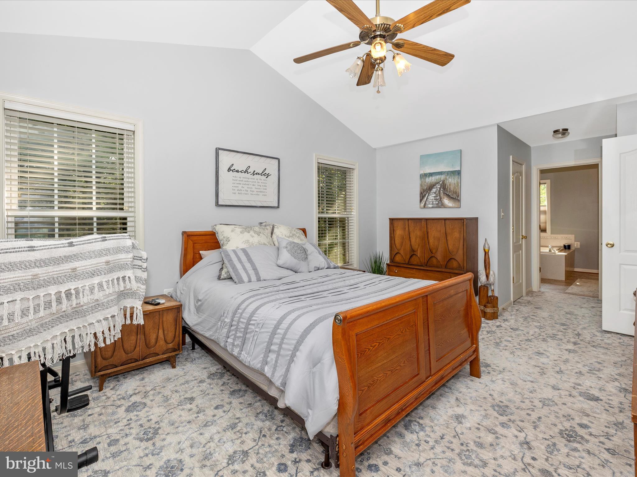 9503 Childacrest Drive Boonsboro, MD 21713 - Photo 29 of 59 a bedroom with a bed and a chandelier