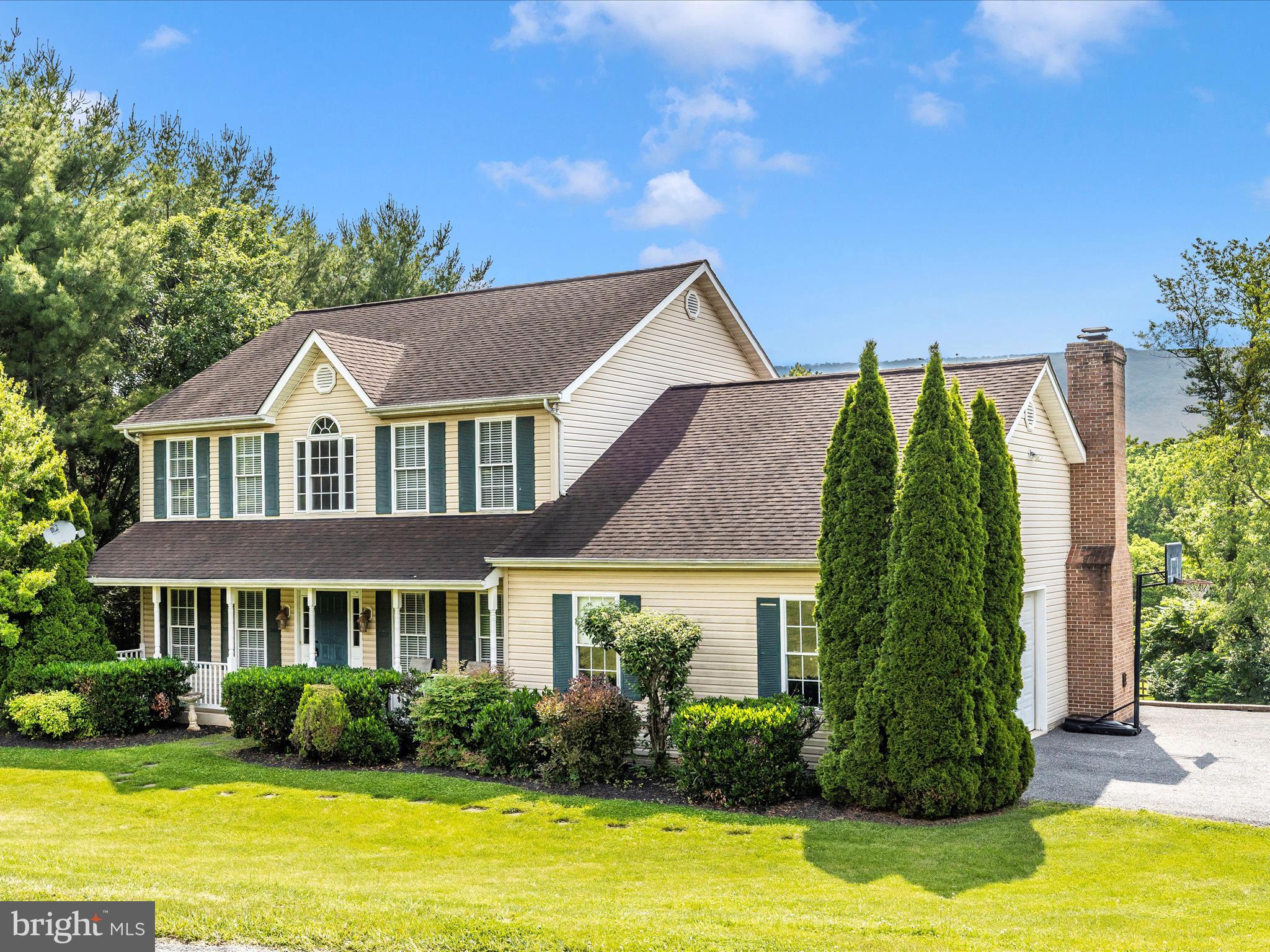9503 Childacrest Drive Boonsboro, MD 21713 - Photo 3 of 59 a front view of a house with a garden