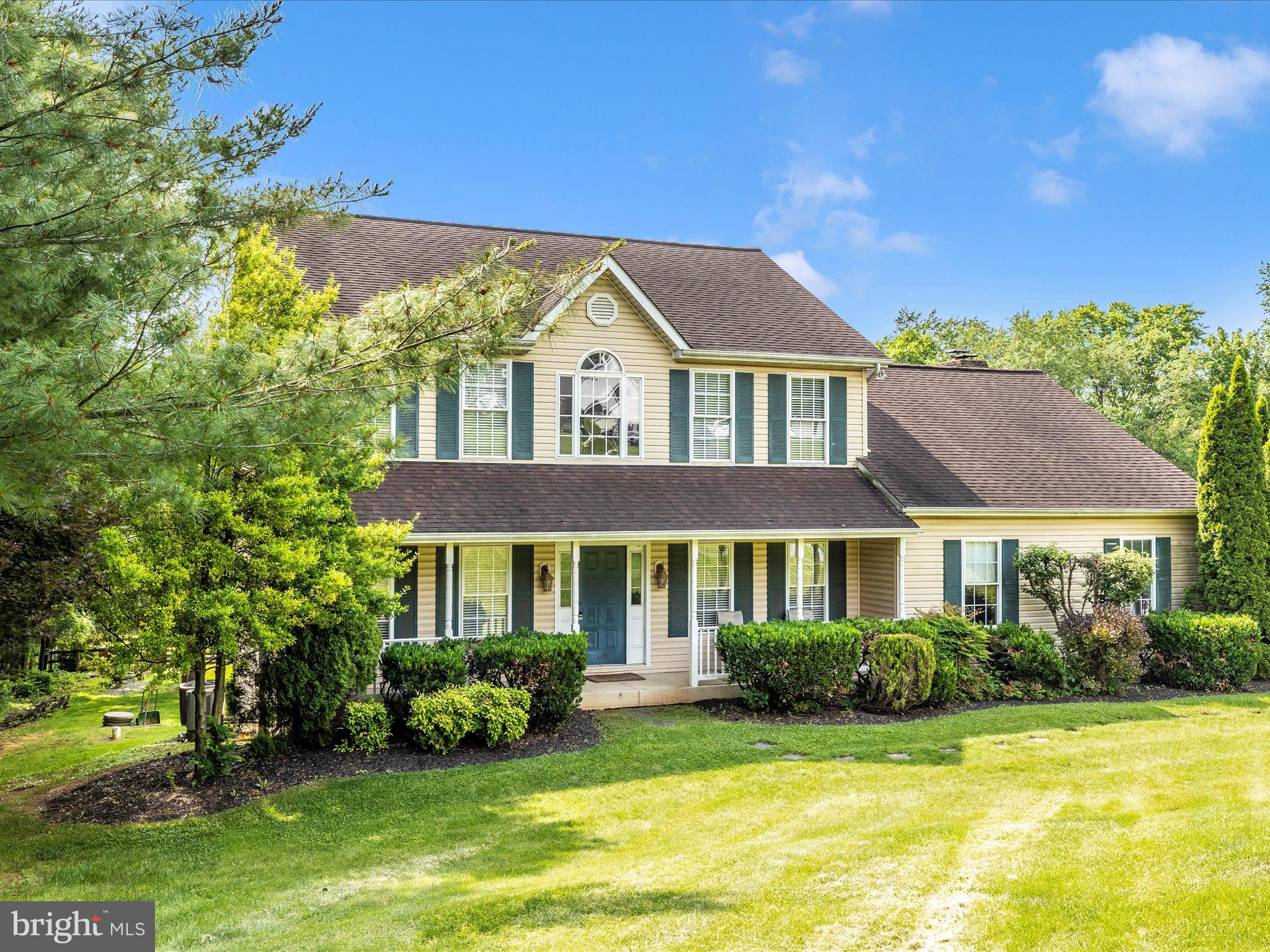 9503 Childacrest Drive Boonsboro, MD 21713 - Photo 4 of 59 a front view of a house with garden