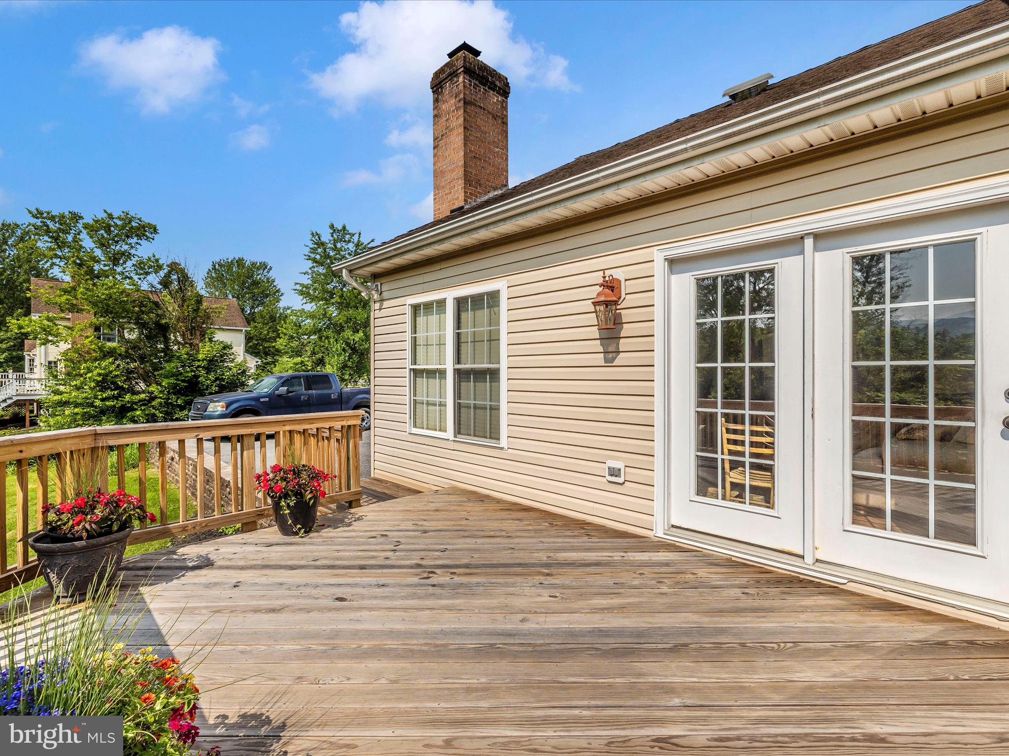 9503 Childacrest Drive Boonsboro, MD 21713 - Photo 53 of 59 a view of a roof deck with wooden floor and seating space