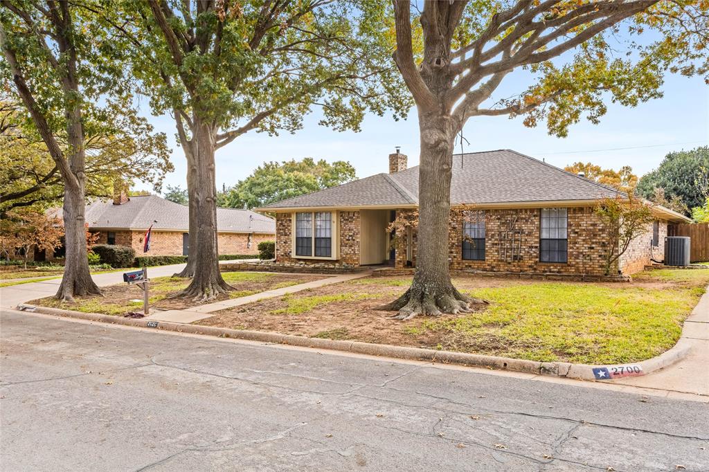 2626 Collard Road Arlington, TX 76017 - Photo 11 of 40 a house with trees in front of it