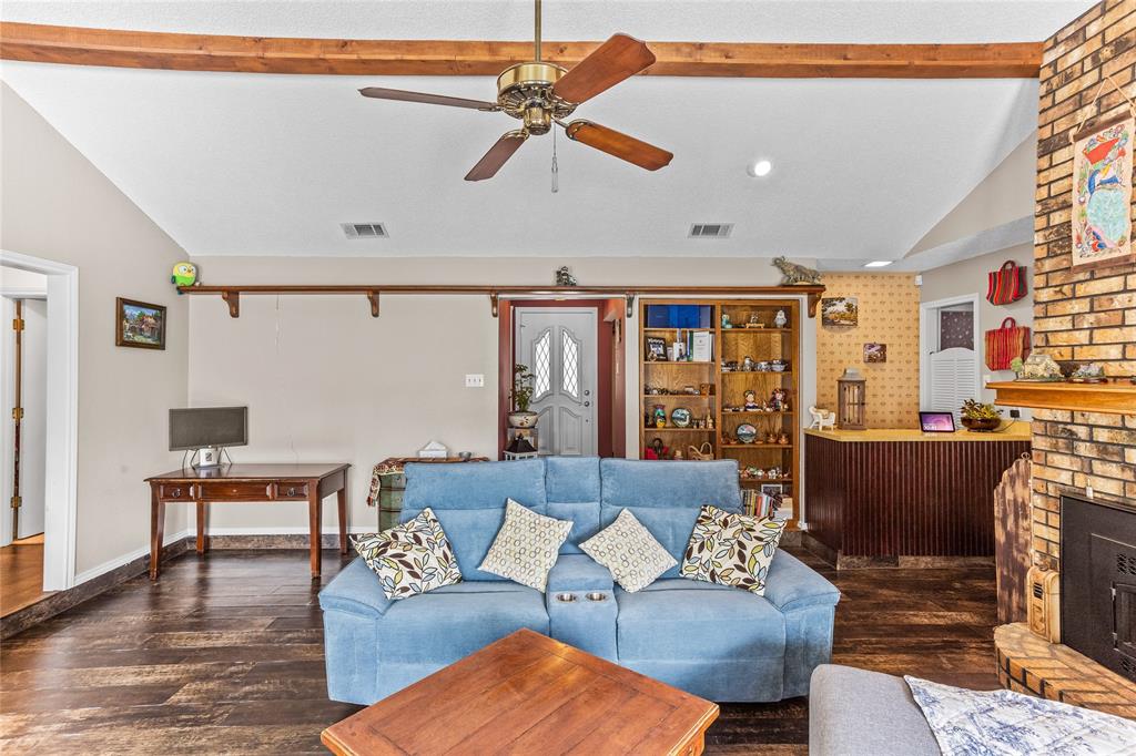2626 Collard Road Arlington, TX 76017 - Photo 19 of 40 a living room with furniture and a ceiling fan