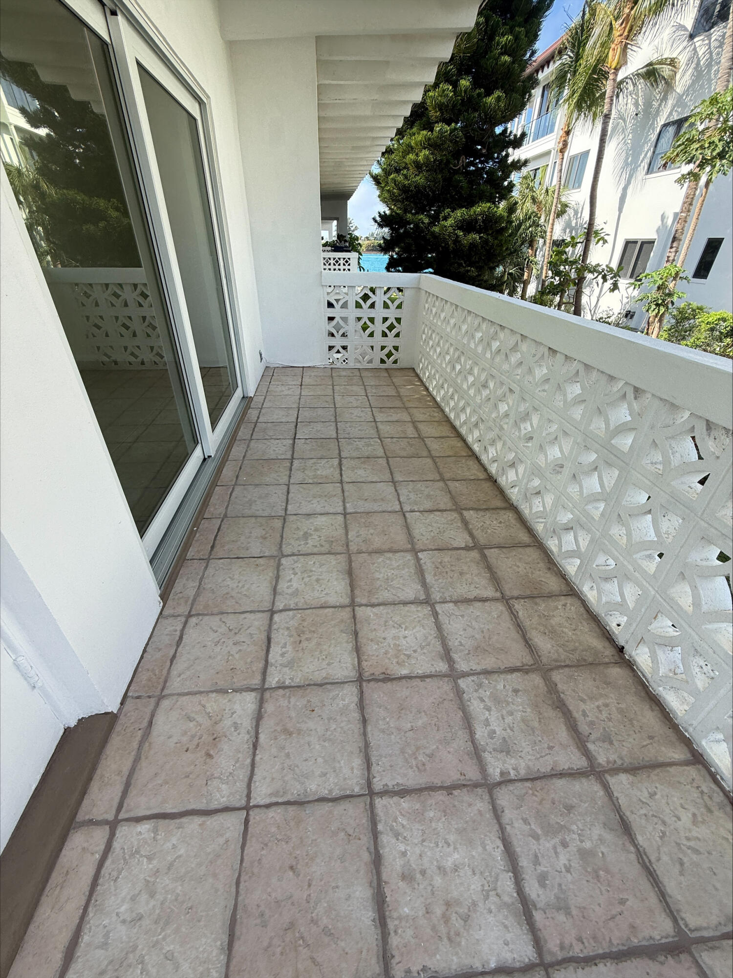 220 Inlet Way, Unit 3 Palm Beach Shores, FL 33404 - Photo 2 of 16 a view of a backyard