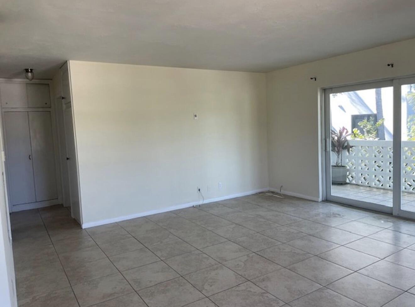 220 Inlet Way, Unit 3 Palm Beach Shores, FL 33404 - Photo 5 of 16 an empty room with sliding door