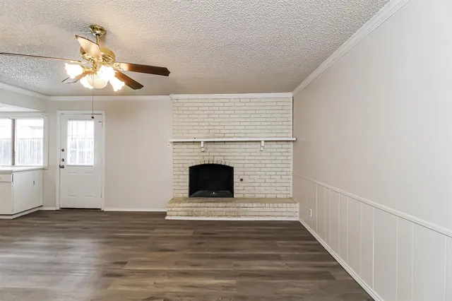 a view of a livingroom with a fireplace