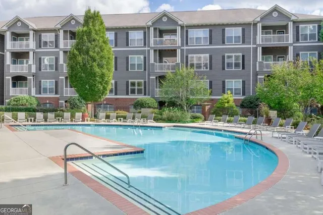 a view of outdoor space yard swimming pool and deck