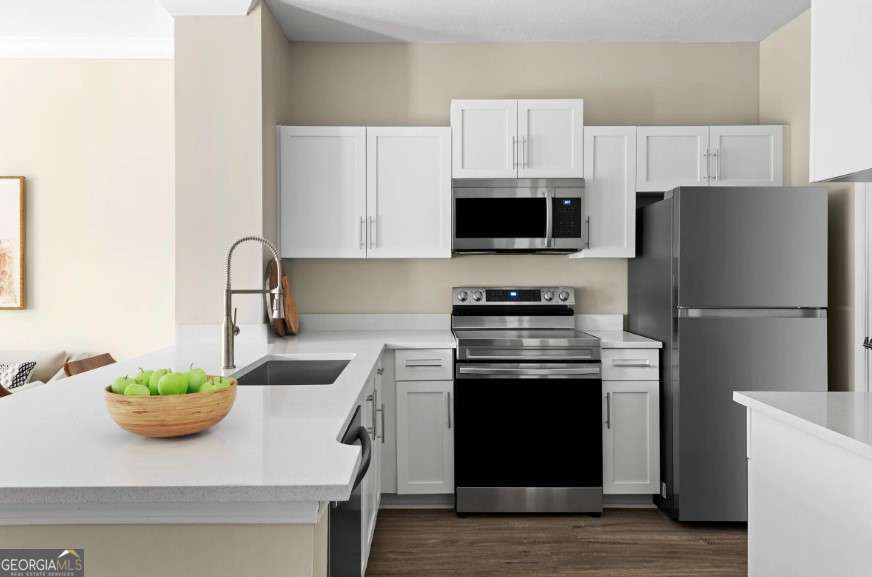 2500 Shallowford Road, Unit 4403 Atlanta, GA 30345 - Photo 2 of 20 a kitchen with a sink a stove and refrigerator