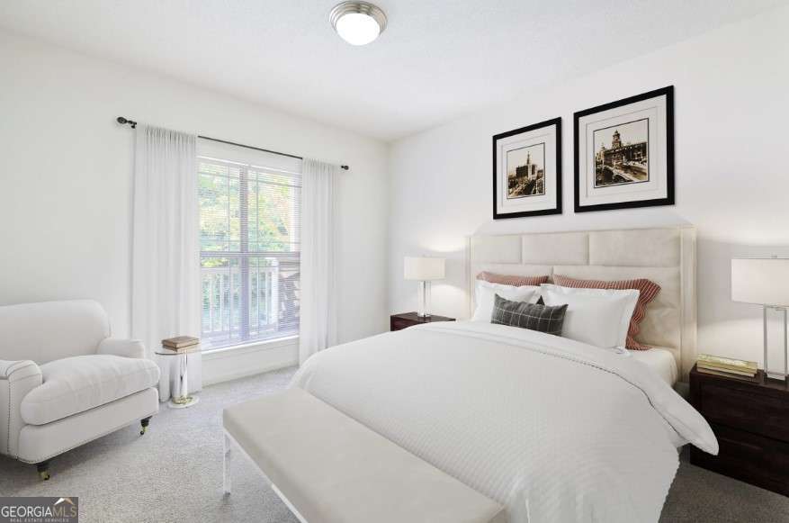 2500 Shallowford Road, Unit 4403 Atlanta, GA 30345 - Photo 8 of 20 a bedroom with a bed and a couch