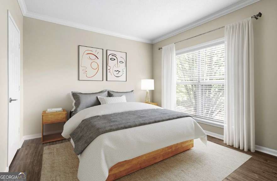 2500 Shallowford Road, Unit 4403 Atlanta, GA 30345 - Photo 9 of 20 a bedroom with a bed and a large window