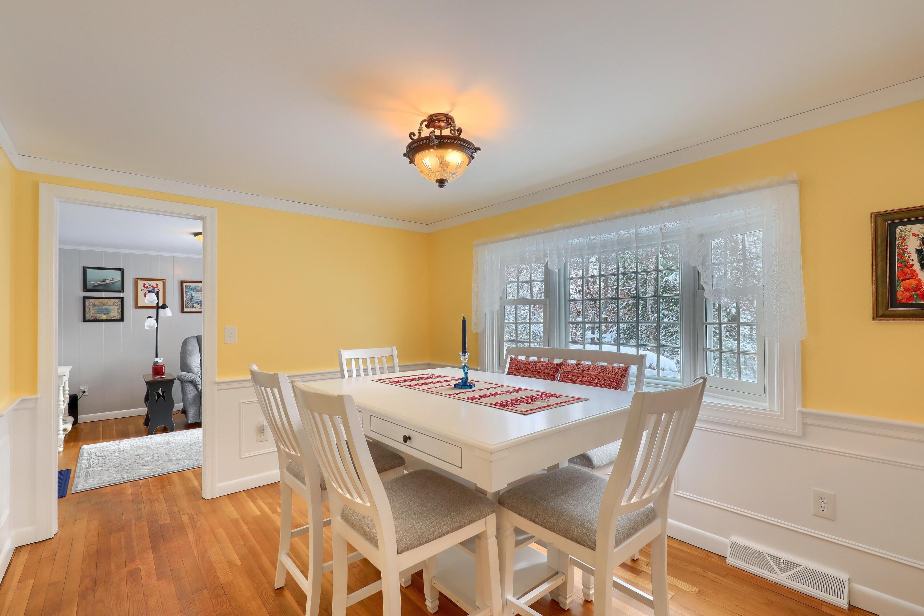 9 Captain Chase Road South Yarmouth, MA 02664 - Photo 17 of 28 a view of a dining room with furniture window and outside view