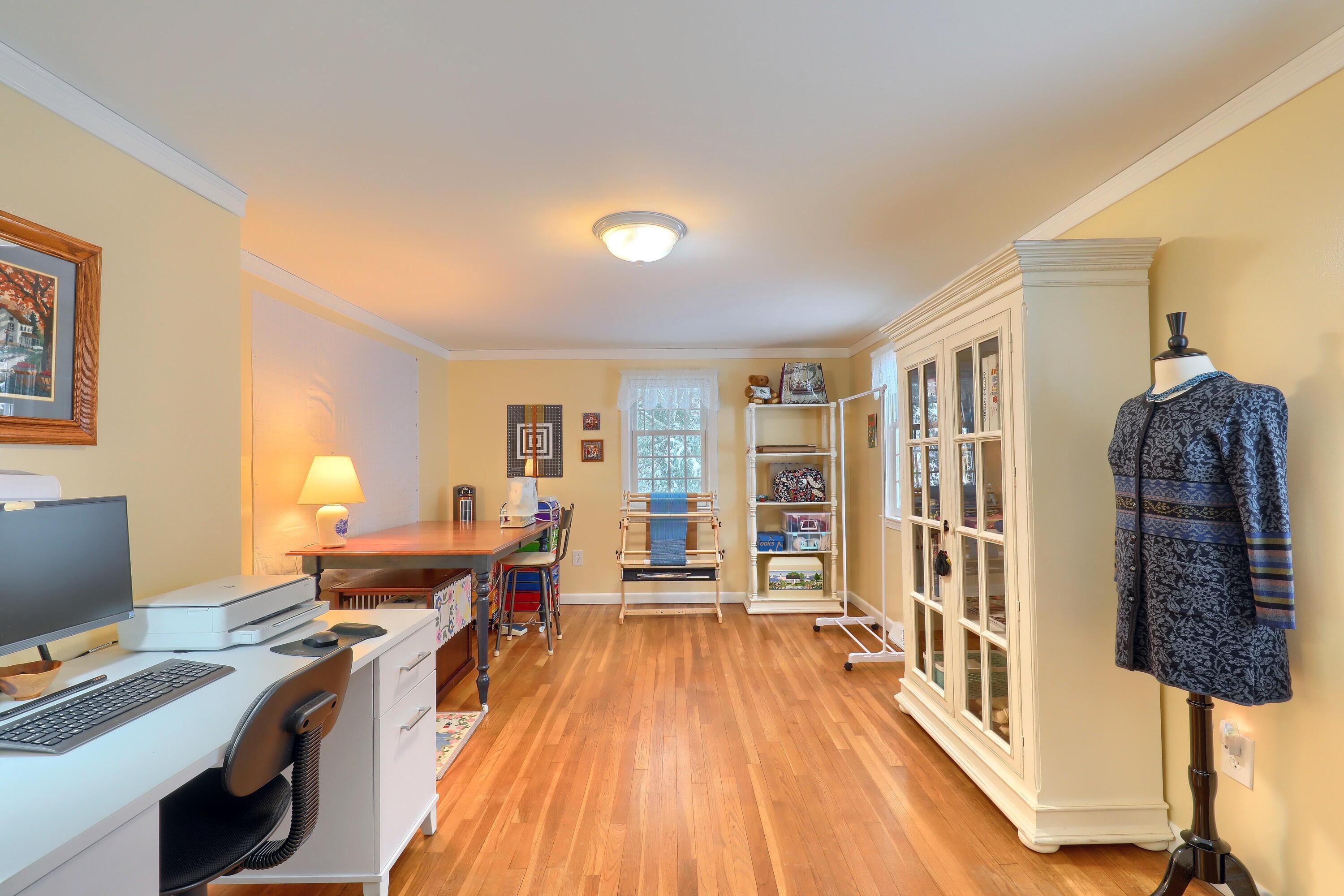 9 Captain Chase Road South Yarmouth, MA 02664 - Photo 18 of 28 a workspace with furniture and wooden floor