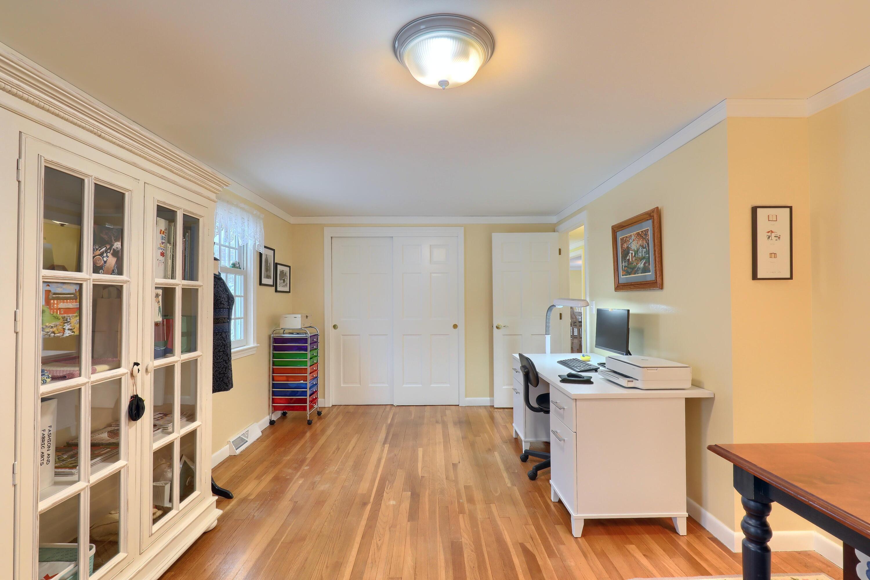 9 Captain Chase Road South Yarmouth, MA 02664 - Photo 19 of 28 a room with furniture a rug and a window