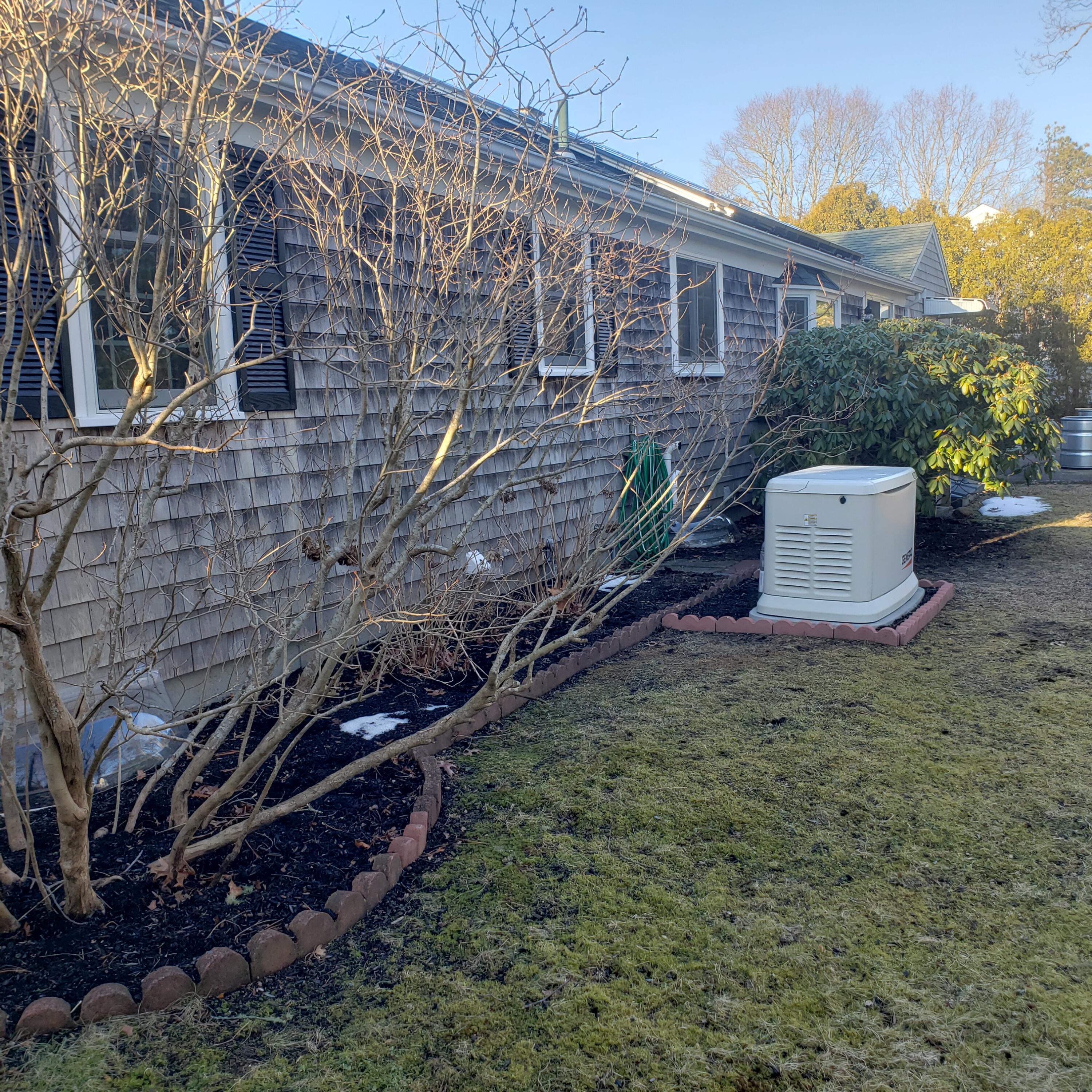 9 Captain Chase Road South Yarmouth, MA 02664 - Photo 27 of 28 a view of a house with a yard