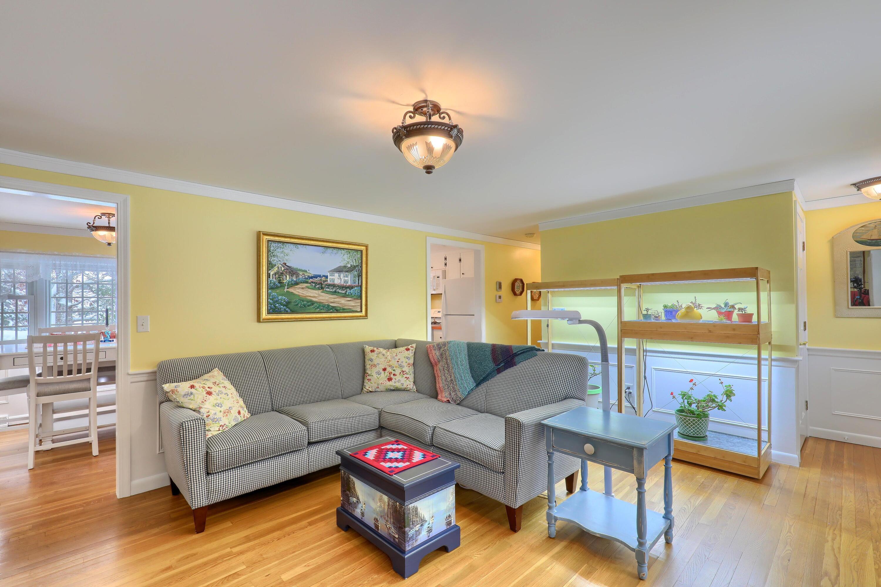 9 Captain Chase Road South Yarmouth, MA 02664 - Photo 7 of 28 a living room with furniture a rug and a window