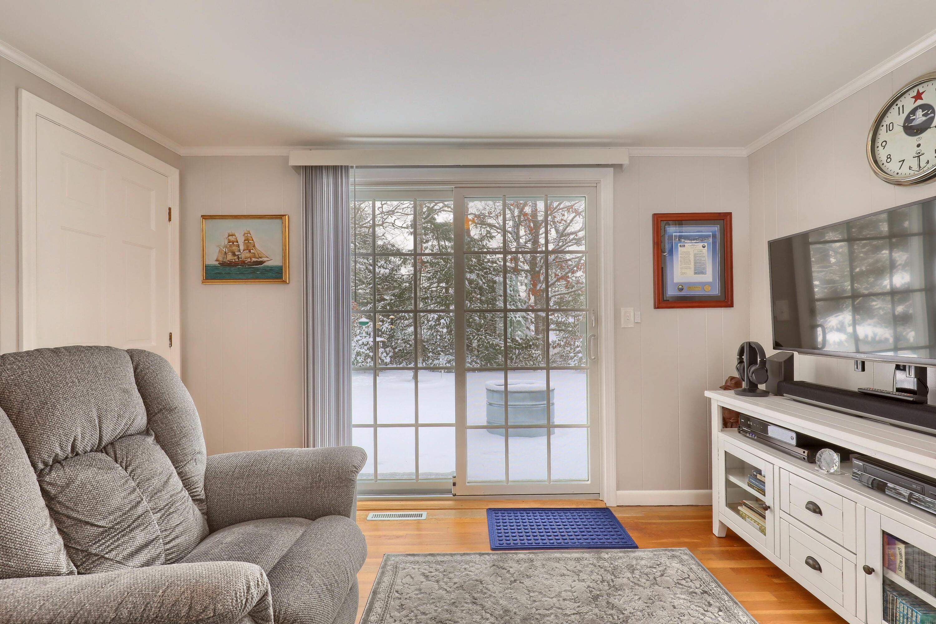 9 Captain Chase Road South Yarmouth, MA 02664 - Photo 8 of 28 a living room with furniture and a window