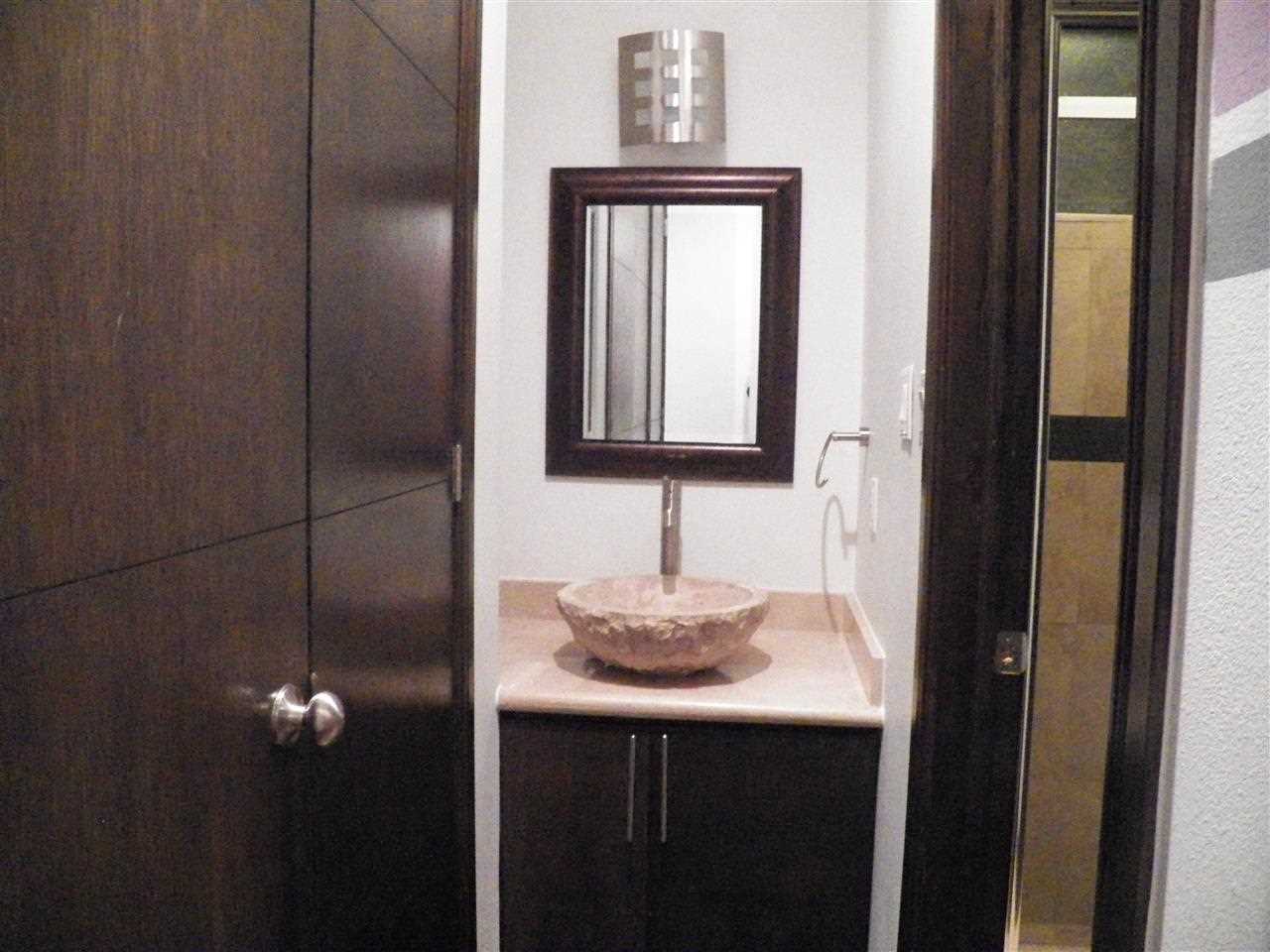 315 Lake Powell Laredo, TX 78041 - Photo 7 of 9 a bathroom with a sink vanity and a mirror
