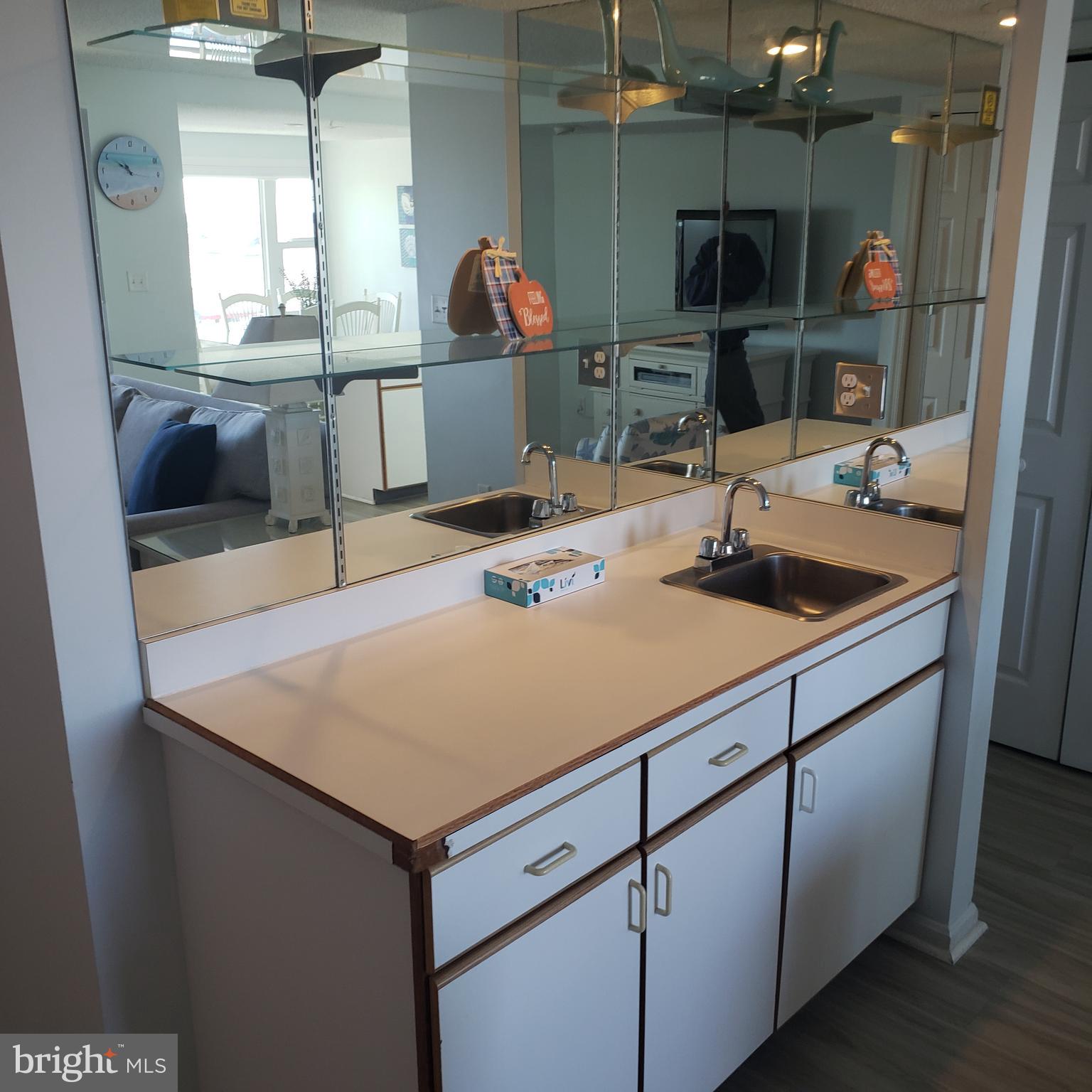 12108 Coastal Highway, Unit 301C Ocean City, MD 21842 - Photo 5 of 17 Wetbar in living room