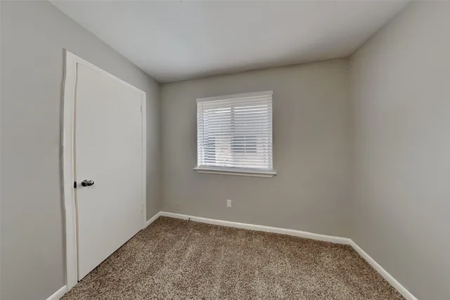 a view of empty room with window