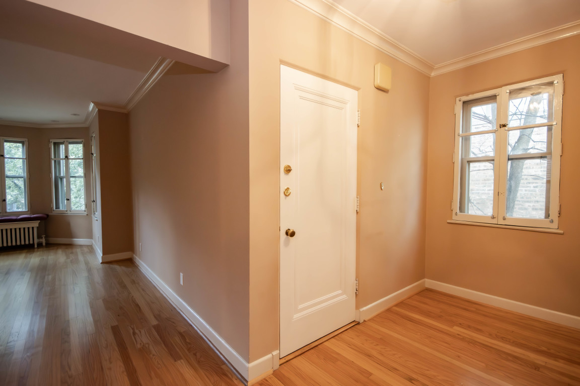 1122 Hull Terrace, Unit 2 Evanston, IL 60202 - Photo 2 of 17 a view of livingroom with hardwood floor and window