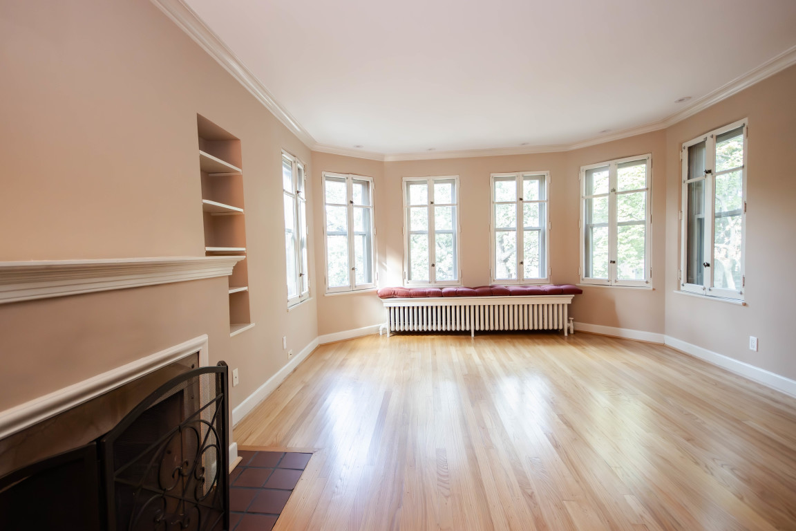 1122 Hull Terrace, Unit 2 Evanston, IL 60202 - Photo 3 of 17 wooden floor in an empty room with a window