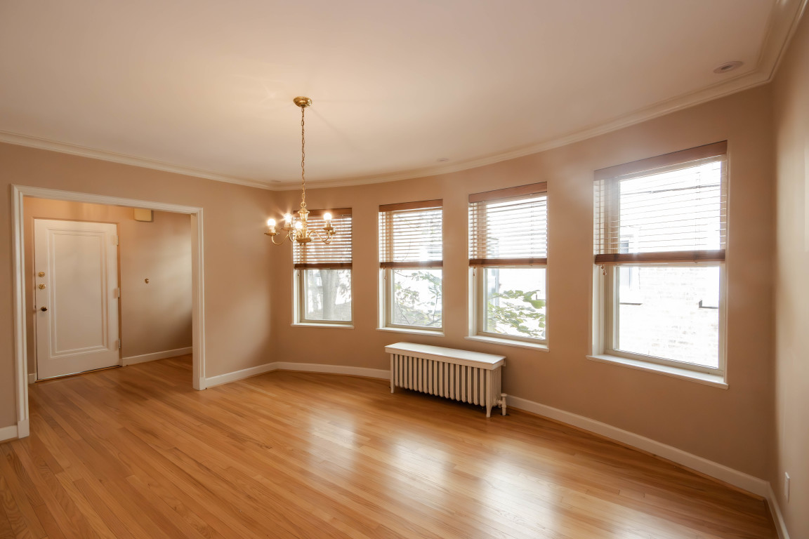 1122 Hull Terrace, Unit 2 Evanston, IL 60202 - Photo 7 of 17 a room with window and entryway