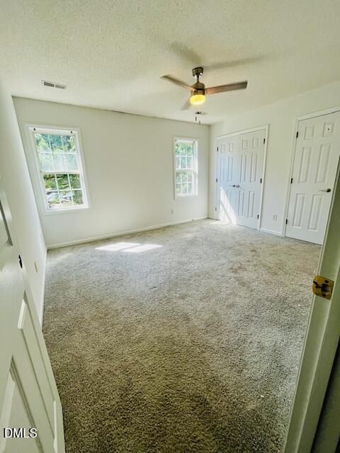 6016 River Lake Circle Raleigh, NC 27604 - Photo 13 of 15 a view of an empty room and a window