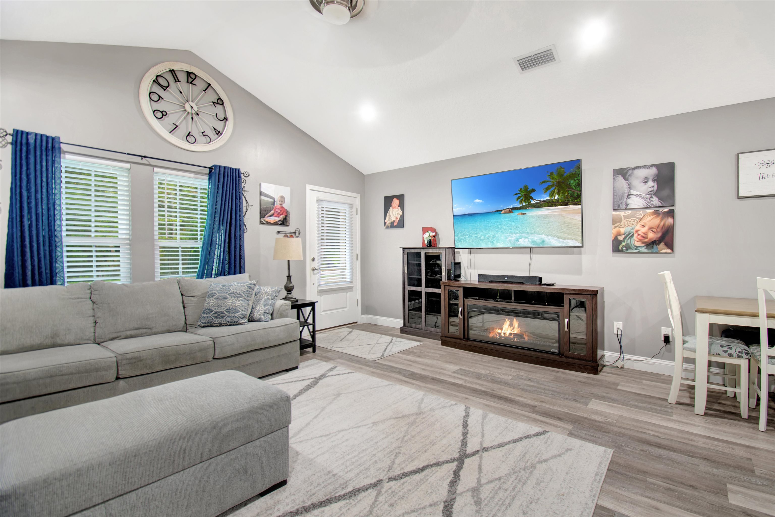 5831 Oak Street Elkton, FL 32033 - Photo 3 of 22 a living room with furniture and a flat screen tv