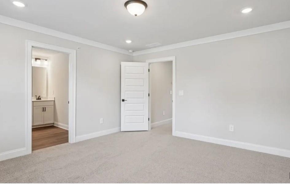 6390 Pinin Place Cumming, GA 30041 - Photo 12 of 14 an empty room with closet area