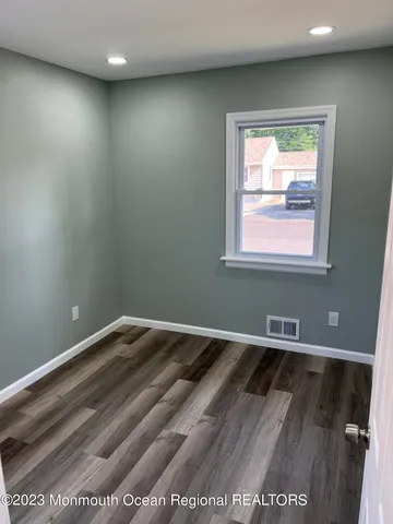 a view of an empty room and window