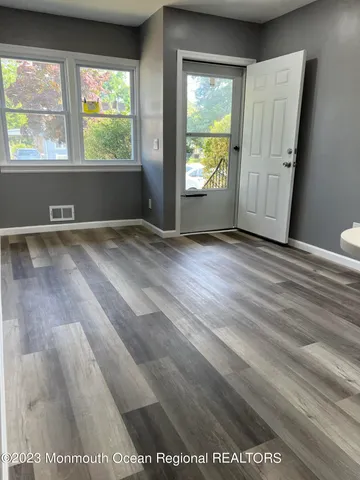 an empty room with windows